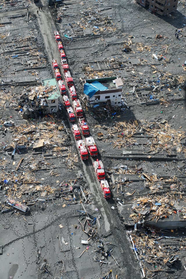 Emergency vehicles staging in the ruins of Otsuchi, Japan following the tsunami
