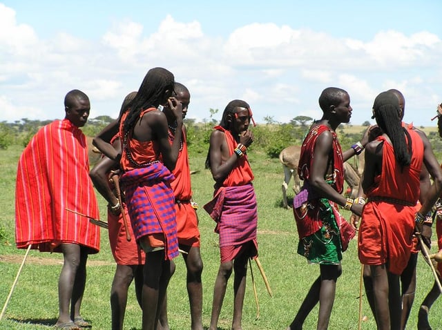 People in hot climates are often slender, lanky, and dark skinned, such as these Maasai men from Kenya.