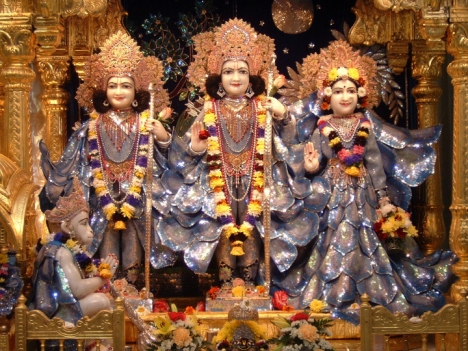 Deities Sita (right), Rama (center), Lakshmana (left) and Hanuman (below, seated) at Bhaktivedanta Manor, Watford, England