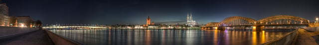 Panoramic view of the city at night as seen from Deutz; from left to right: Deutz Bridge, Great St. Martin Church, Cologne Cathedral, Hohenzollern Bridge