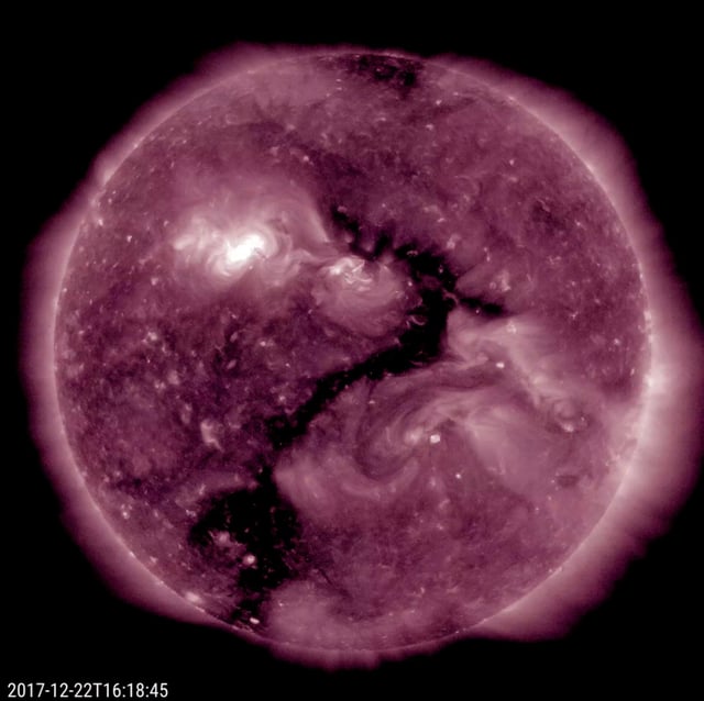 Coronal hole on the Sun forms a question mark (22 December 2017)