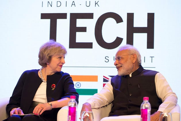 Modi and British Prime Minister Theresa May at the India-UK Tech Summit in New Delhi