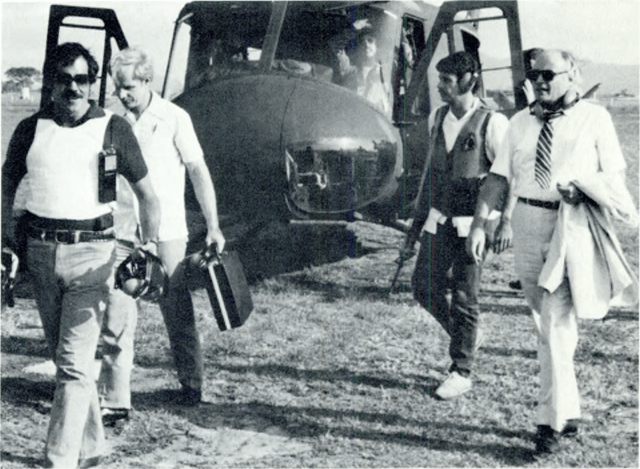 Armed Department of State security agents accompany U.S. Ambassador Deane Hinton in El Salvador in the early 1980s.