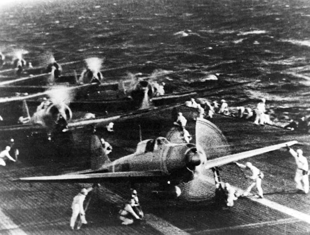 Mitsubishi A6M2 "Zero" fighters on the Imperial Japanese Navy aircraft carrier Shōkaku, just before the attack on Pearl Harbor