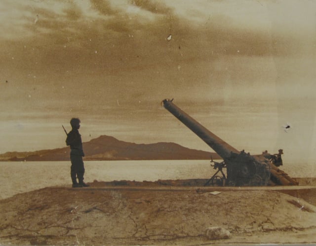 An Israeli soldier stands next to an Egyptian gun that had blocked the Tiran Straits.