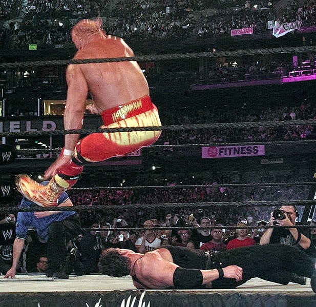 Hogan performing his signature Atomic Leg Drop on Mr. McMahon at WrestleMania XIX
