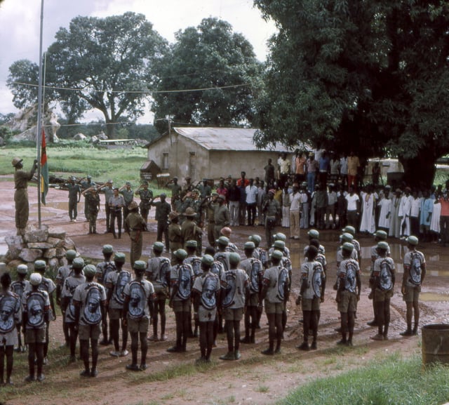 PAIGC forces raise the flag of Guinea-Bissau in 1974.