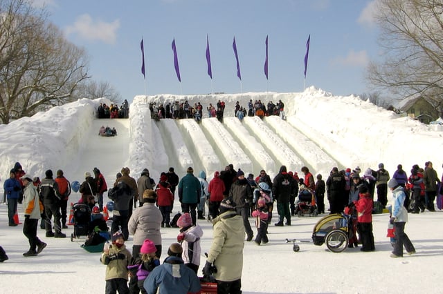People on ice slides during Winterlude, an annual winter festival held in Ottawa
