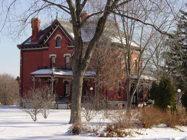 The Martin-Mitchell Mansion, within the Naper Settlement outdoor museum, is listed on the National Register of Historic Places