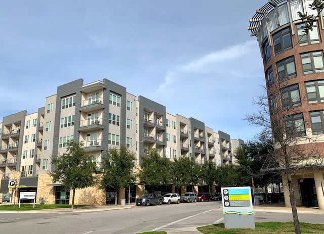 Mid-rise One-plus-five style apartment buildings in Austin, Texas.