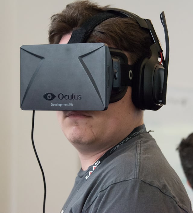 Palmer Luckey wearing an Oculus Rift DK1 (development kit 1) during a demo at SVVR 2014.