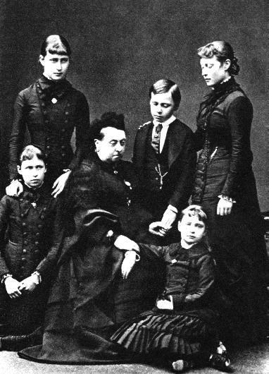 Princess Alix of Hesse, lower right, with her grandmother Queen Victoria and her four older siblings in mourning after the deaths of her mother and sister. January 1879