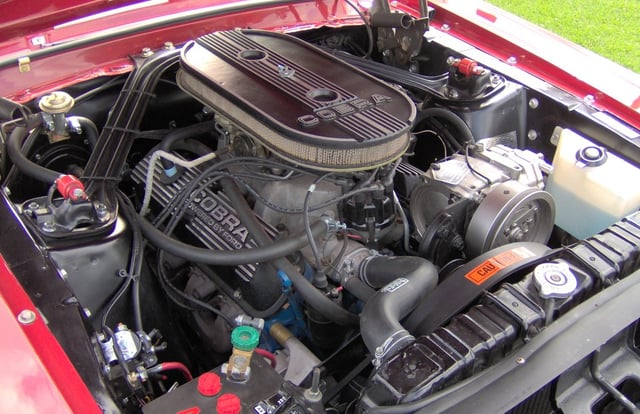 Ford 289 K-code engine in a Shelby GT 350: The radiator hose connects to the intake manifold, a telltale Windsor feature.