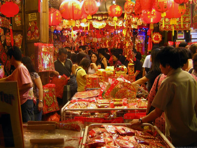 Shoppers at a New Year market in Chinatown, Singapore