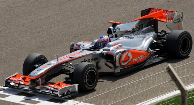 Button's first race for McLaren was the 2010 Bahrain Grand Prix.