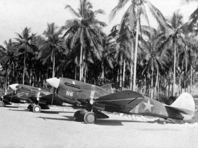 By mid-1943, the USAAF was superseding the P-40F (pictured); the two nearest aircraft, "White 116" and "White 111" were flown by the aces 1Lt Henry E. Matson and 1Lt Jack Bade, 44th FS, at the time part of AirSols, on Guadalcanal.