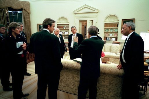 U.S. President George W. Bush meets with his top advisors on 19 March 2003 just before the invasion
