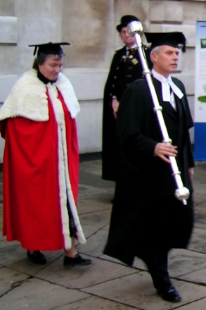 University officials leading the Vice-Chancellor's deputy into the Senate House