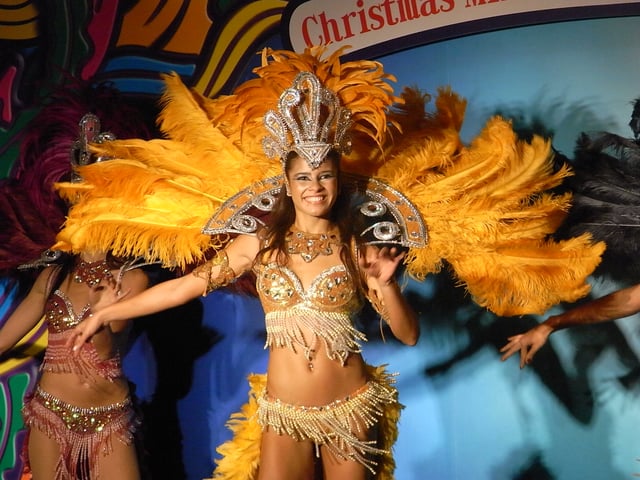 Street samba dancers perform in carnival parades and contests