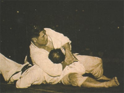 Masahiko Kimura vs. Hélio Gracie, a 1951 bout between judoka Masahiko Kimura and Brazilian jiu jitsu founder Hélio Gracie in Brazil, was an early high-profile mixed martial arts bout.