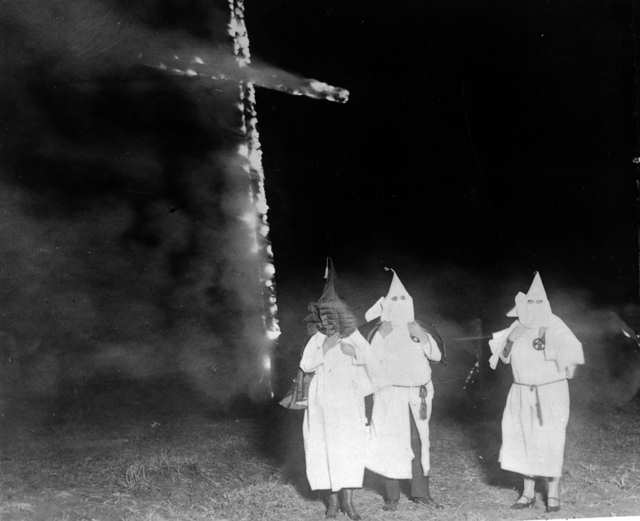 Cross burning was introduced by William J. Simmons, the founder of the second Klan in 1915.