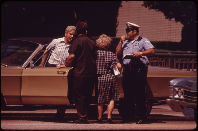 Chicago Police officer in 1973 inquiring about a traffic accident