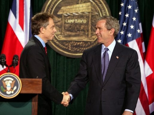 Tony Blair (left) and George W. Bush at Camp David in March 2003, during the build-up to the invasion of Iraq