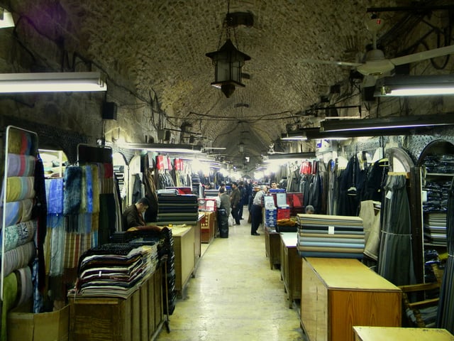 Souq al-Dira', maintaining its traditional role as a tailoring centre