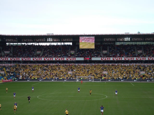 The supporters of Lillestrøm, "Kanari-fansen". From a match between Lillestrøm and Vålerenga at Ullevaal Stadion in 2006.