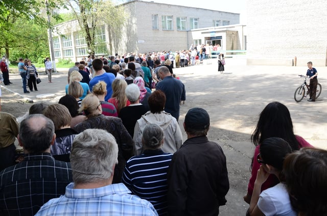 Referendum organized by the rebels. A line to enter a polling place, 11 May 2014