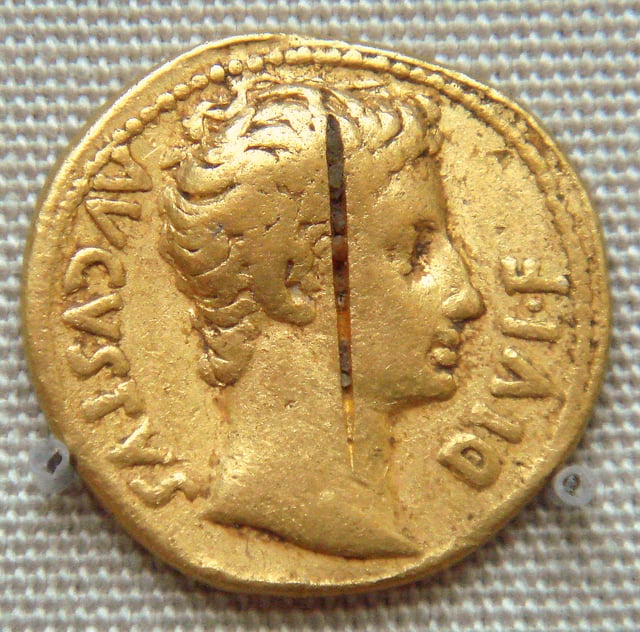Coin of Augustus found at the Pudukottai hoard, from an ancient Tamil country, Pandyan Kingdom of present-day Tamil Nadu in India, a testimony to Indo-Roman trade. British Museum. Caption: AVGVSTVS DIVI F[ILIVS].
