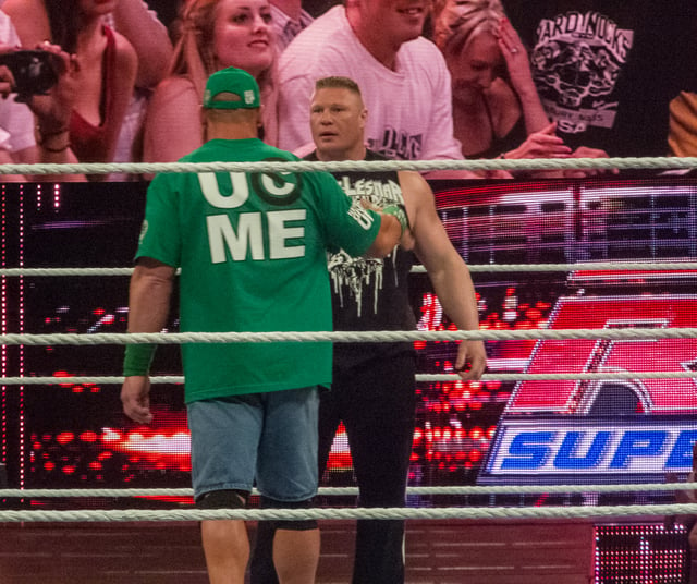 Lesnar faces off with John Cena upon his return in April 2012.