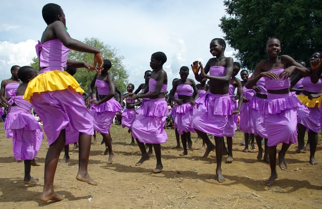 Ugandan youth dance at a cultural celebration of peace