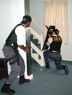 Two DEA agents in a shoot house exercise.