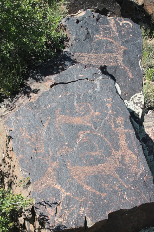Hunting scene in Koksu petroglyphs
