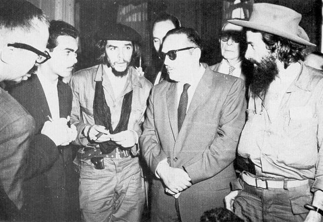 (Right to left) rebel leader Camilo Cienfuegos, Cuban President Manuel Urrutia, and Guevara (January 1959)