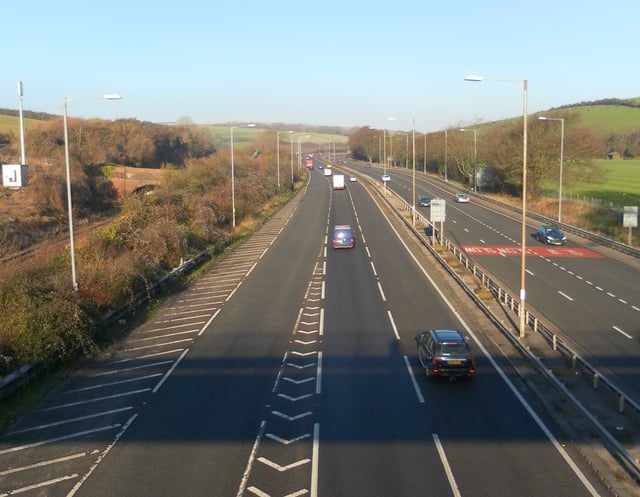 The Brighton Main Line railway (left) and A23 road link Brighton to London.