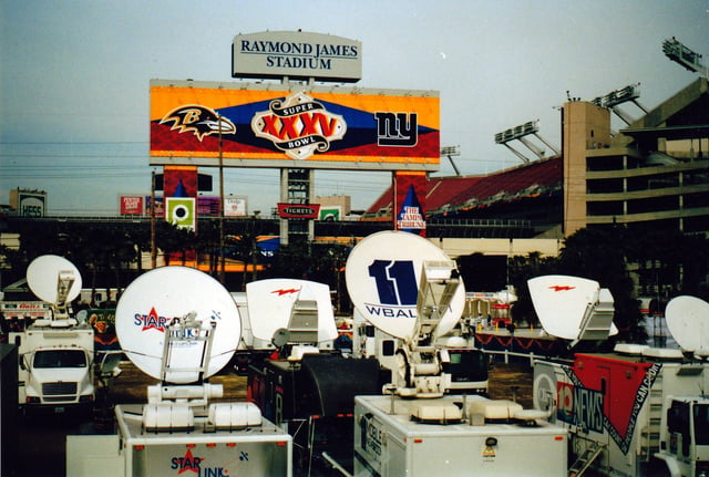 The Super Bowl XXXV broadcasting compound, full of satellite trucks.