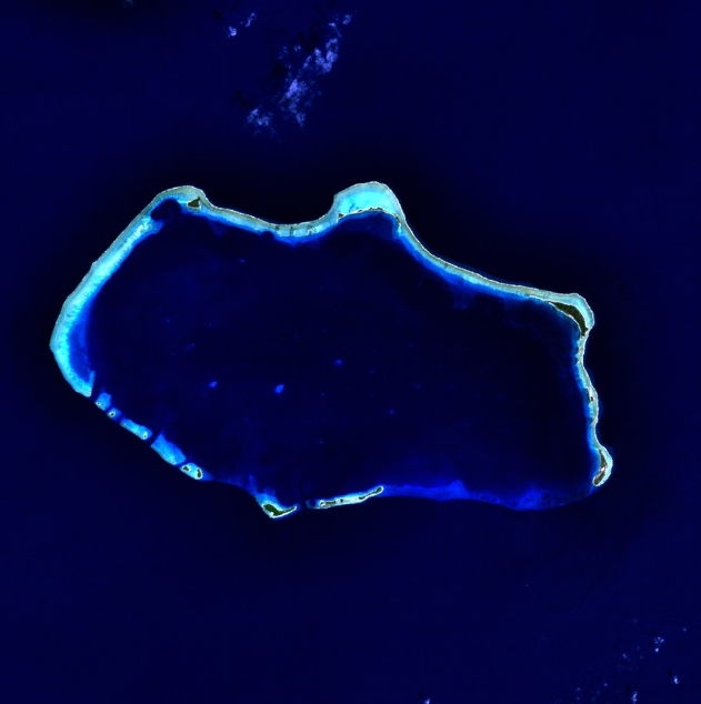 Bikini Atoll, a coral reef in the Pacific Ocean. Tom Kenny confirmed the fictitious city of Bikini Bottom is named after Bikini Atoll.