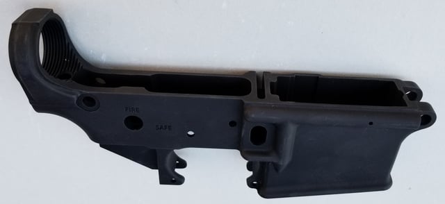 A stripped lower receiver, one that is lacking the additional parts included in a completed lower receiver, is the only part of an AR-15 style rifle that needs to be transferred through a federally licensed firearms dealer under United States federal law.