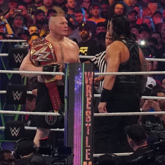 Lesnar facing Roman Reigns before their Universal Championship match at WrestleMania 34