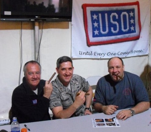 Gandolfini and Tony Sirico visit a member of the United States Air Force during a United Service Organizations visit to southwest Asia (March 2010)