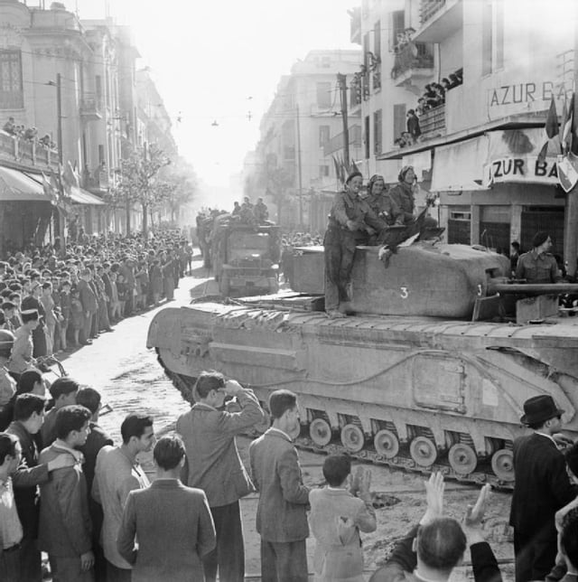 British tank moves through Tunis during the liberation, 8 May 1943