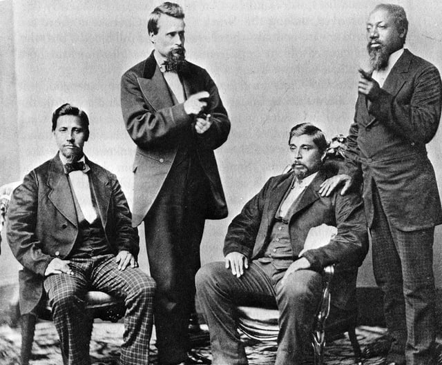 Members of the Creek (Muscogee) Nation in Oklahoma around 1877; they include men with some European and African ancestry.