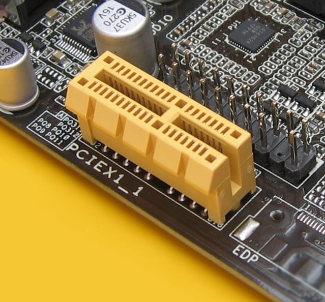 An open-end PCI Express ×1 connector, allowing longer cards capable of using more lanes to be plugged while operating at ×1 speeds