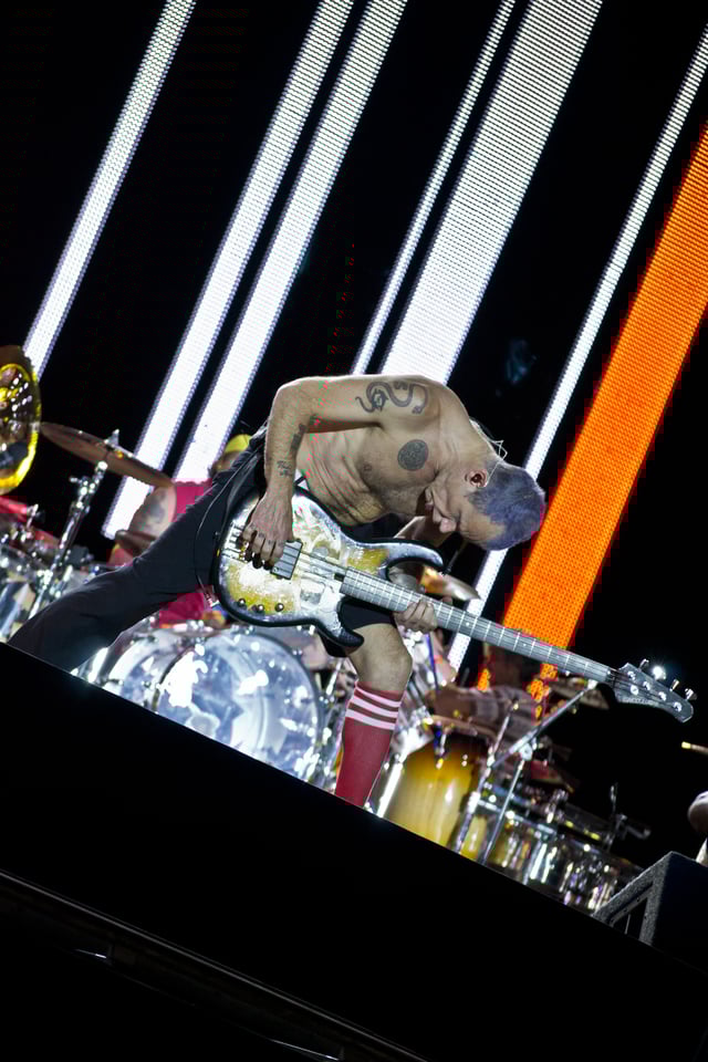 Flea performing with the Red Hot Chili Peppers at the 2012 Rock in Rio festival in Madrid