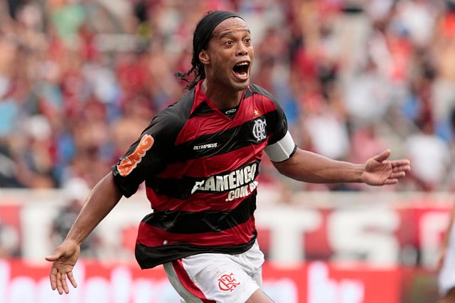 Ronaldinho celebrates scoring for Flamengo in February 2011