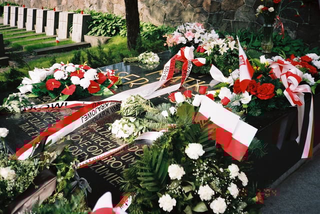Grave of Piłsudski's mother in Vilnius, Lithuania. The huge black tombstone is inscribed: "Matka i serce syna" ("A mother and the heart of [her] son") and bears evocative lines from a poem by Słowacki.
