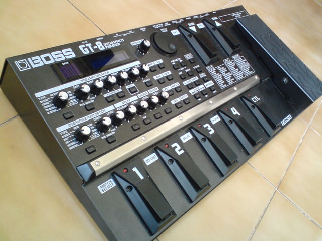The Boss GT-8, a higher-end multi-effect processing pedal; note the preset switches and patch bank foot switches and built-in expression pedal.