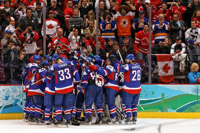 The Slovak national ice hockey team celebrating a victory against Sweden at the 2010 Winter Olympics